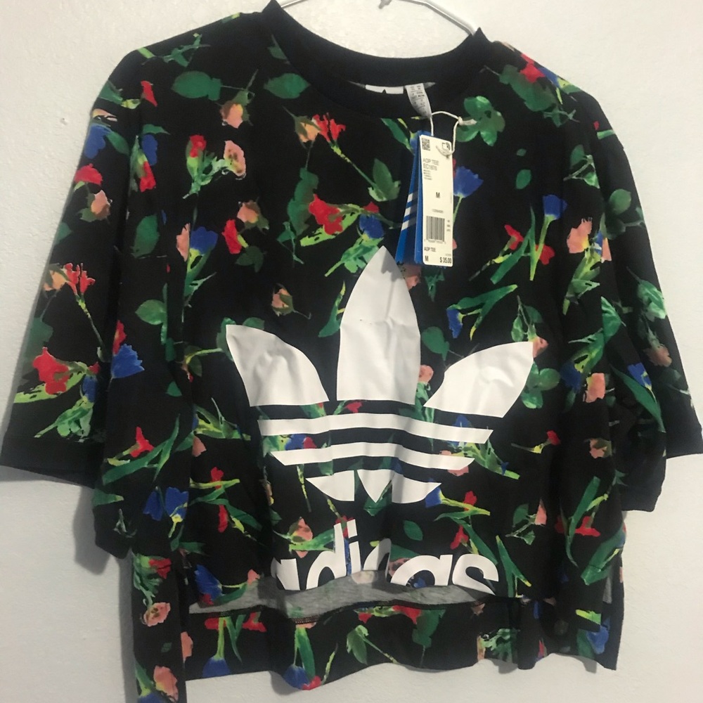 Adidas medium woman shirt. Runs big